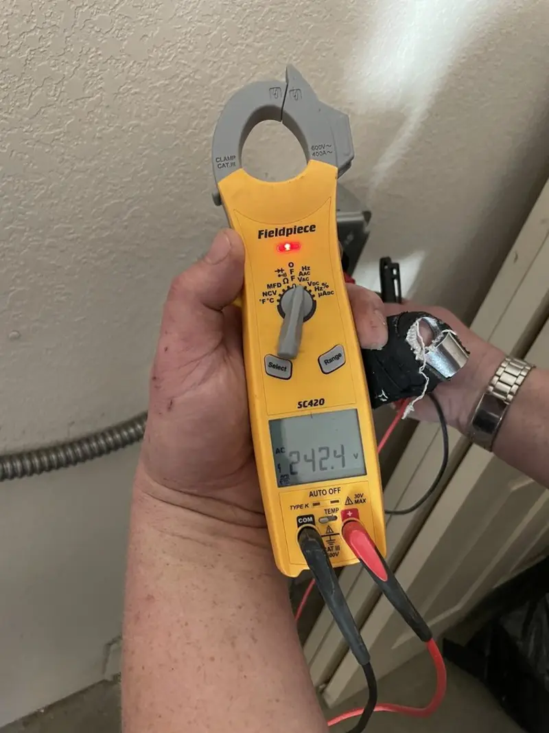 Voltage testing with clamp meter during Hot Tub / Pool Electrical Wiring in Pickens